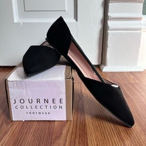 Women’s black ballet flats size 10.